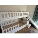 Wit stapelbed met trap en glijbaan